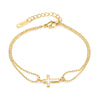 Women's cross bracelet - gold